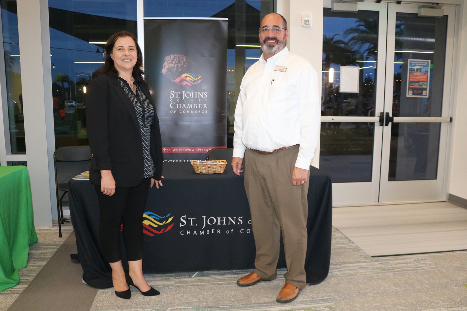 Isabelle Renault, St. Johns County Chamber of Commerce president and CEO, and Scott Maynard, director of economic development for the Chamber, are seen at one of the tables at the link’s Business Expo.